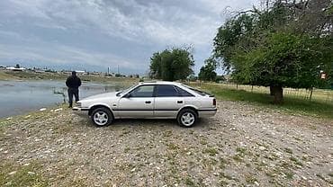 step wgn: Mazda 616: 1991 г., Механика, Бензин, Хэтчбэк — 3