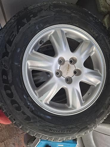 5: Комплект колес Subaru на дисках + всесезонные шины Goodyear - Диски — 4