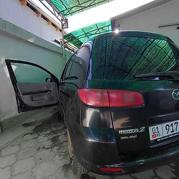 mazda cronos: Mazda 2: 2005 г., 1.3 л, Механика, Бензин, Хэтчбэк — 10