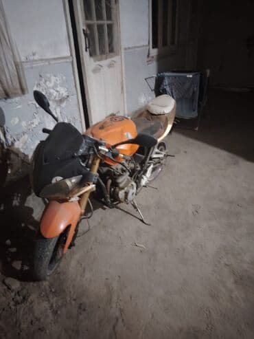 купить мотоциклы в бишкеке: Мотоцикл стрит/нейкед оранжевого цвета с черным лобовым обтекателем — 4