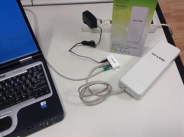 Модемы и сетевое оборудование: Наружная точка доступа TL-WA7510N . Tp-link. В комплекте сама точка — 5