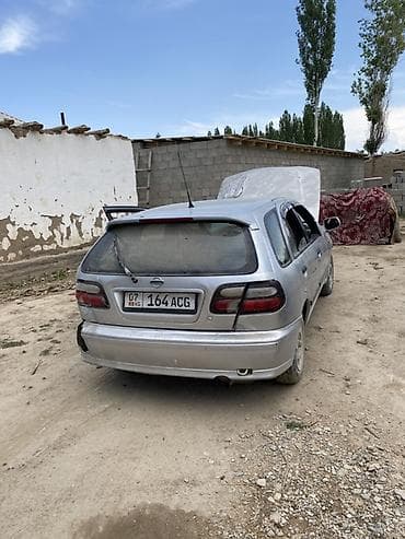 Унаа: Nissan Almera: 1999 г., Кол менен иштөөчү, Бензин, Хетчбек — 7