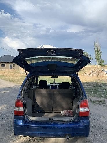 Унаа: Mazda Demio: 2002 г., 1.3 л, Кол менен иштөөчү, Бензин, Хетчбек — 7