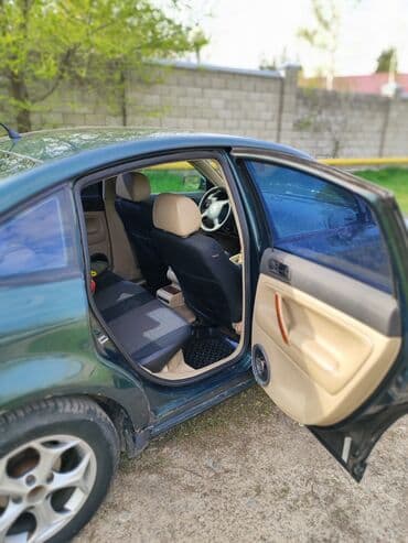 вариантка: Volkswagen Passat: 1998 г., 1.8 л, Седан — 4