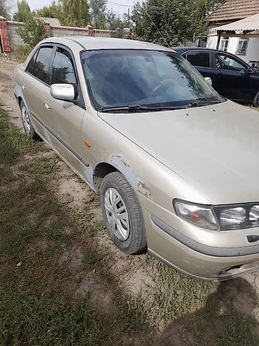 амортизатор lexus: Mazda 626: 1997 г., 2 л, Автомат, Бензин, Седан — 1