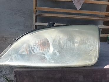 Автозапчасти: Передняя левая фара Ford 2005 г., Б/у, Оригинал, США — 1