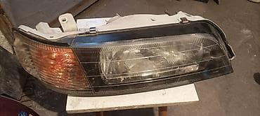 ГБО: Передняя правая фара Nissan 1997 г., Б/у, Оригинал, Япония — 1