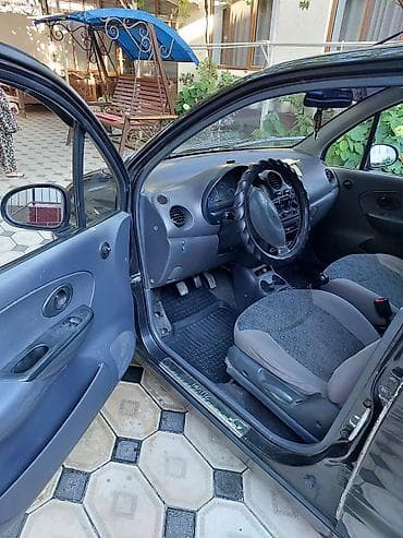 Унаа: Daewoo Matiz: 2011 г., 0.8 л, Кол менен иштөөчү, Бензин, Хетчбек — 8
