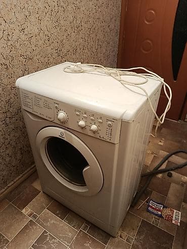 70: Стиральная машина Indesit IWSC 6105, фронтальная загрузка — 4