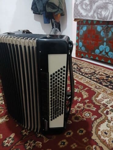 шлемы мото: Акордеон Weltmeister (кнопочно-клавишный) Описание: - Полноразмерный — 2