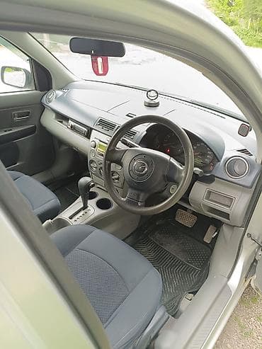 шампунь для авто: Mazda Demio: 2004 г., 1.3 л, Автомат, Бензин, Хэтчбэк — 8