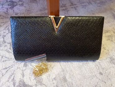 Киреге берилүүчү кийимдер: Клатч (новый)
Размер 27*15 см
В комплекте ремешок-цепочка — 2