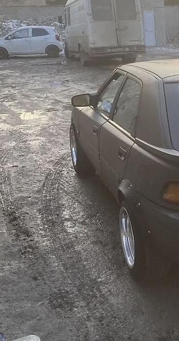 second tech: Mazda 323: 1990 г., 1.6 л, Механика, Бензин, Хэтчбэк — 7