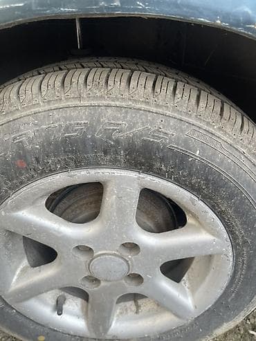 марк: Nissan March: 2000 г., Хэтчбэк — 5