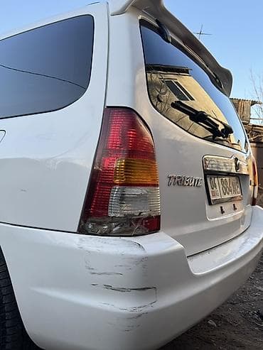 2 9тд: Mazda Tribute: 2003 г., 2 л, Автомат, Бензин, Кроссовер — 6