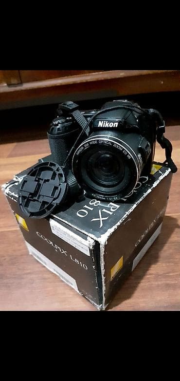 Фотоаппарат Nikon мало пользовался работает пальчиком батарейки.цена