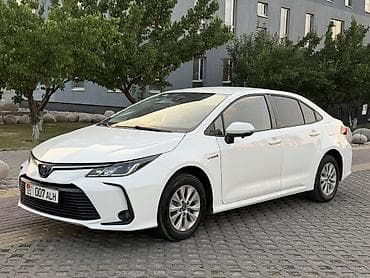 Toyota Corolla: 2019 г., 1.8 л, Вариатор, Гибрид, Седан — 1