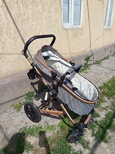 эмили коляска: Универсальная детская коляска с золотистой рамой и серым сиденьем — 2