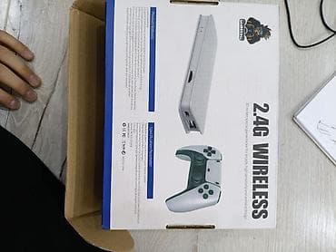 Игровая ТВ-приставка с беспроводными геймпадами 2.4G Основное: -