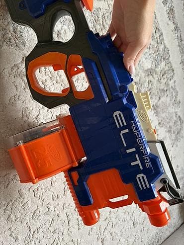 красный страитель: Б/у Бластер NERF N-Strike Elite HyperFire
Оригинальный Б/у — 2