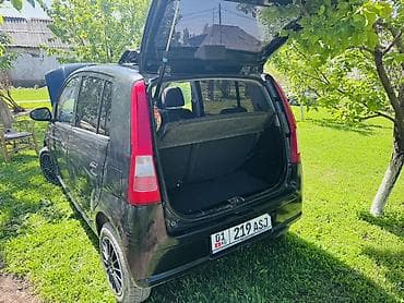 100 с4: Daihatsu Cuore: 2004 г., 1 л, Ручные, Бензин, Хэтчбэк — 3