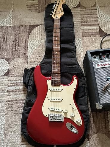 Музыкальные инструменты: - Электрогитара Squier by Fender в стиле Stratocaster, цвет Candy — 2