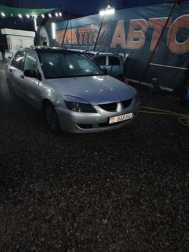geely mongaro: Mitsubishi Lancer: 2005 г., Седан — 2