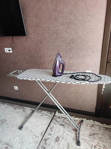 Уход за одеждой: Утюг Philips DST7061 Характеристики: Постоянная подача пара: 55 г/мин — 10