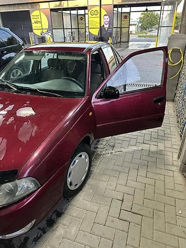 e500 124: Daewoo Nexia: 2011 г., Седан — 5