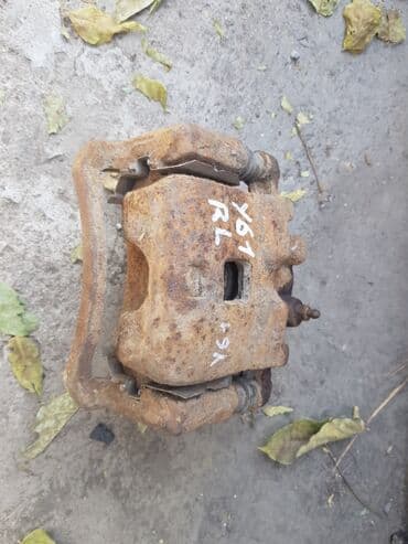 система форсунок: Nissan Patrol Y61 тормозной суппорт. Ниссан Патруль Y61 суппорт — 1