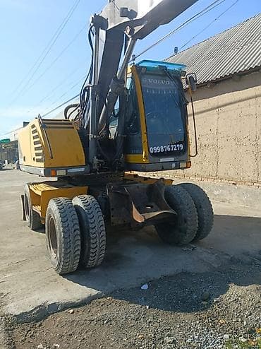 Транспорт: Экскаватор, Volvo, 2004 г., Колесный — 4