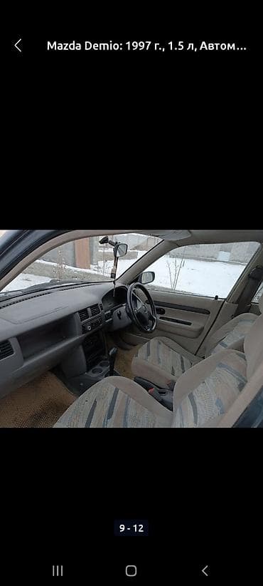 дисплей авто: Mazda Demio: 1997 г., 1.5 л, Автомат, Бензин, Минивэн — 9