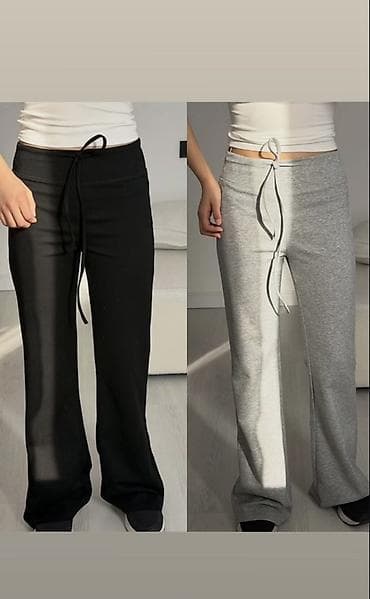 штаны джогеры: Женские брюки-джоггеры с прямой, слегка расклёшенной штаниной. Высокая — 1