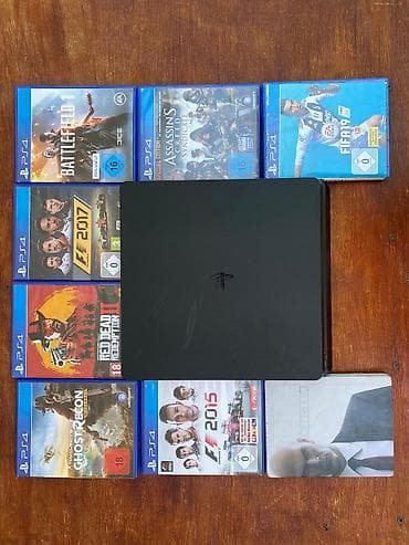 Playstation 4 slim,память:1тб 3 джойстик и 10шт диски. г.Ош. состояние