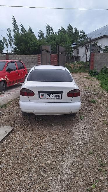 ravon nexia: Daewoo Lanos: 1997 г., Кол менен иштөөчү, Седан — 2