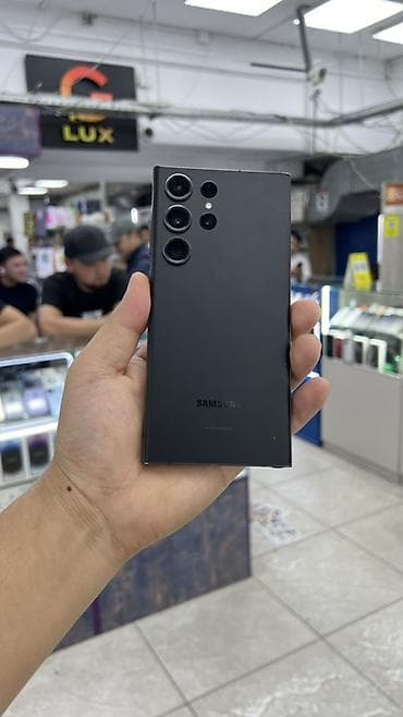 чипс: Samsung Galaxy S23 Ultra, Б/у, 256 ГБ, цвет - Черный, 1 SIM, eSIM — 1