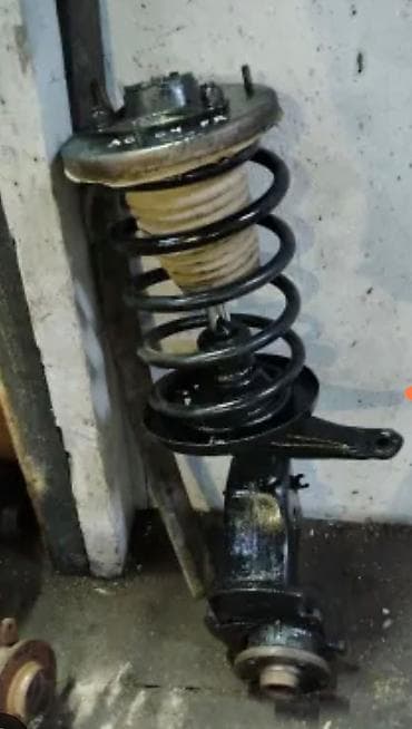 диагностика ходовки: Передняя стойка подвески в сборе (MacPherson) с поворотным кулаком и — 1