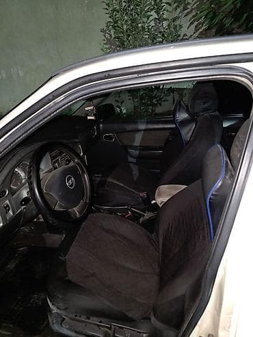 Daewoo Nexia: 2012 г., Седан — 5