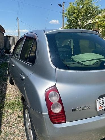 byd e6: Nissan March: 2002 г., 1.4 л, Автомат, Бензин, Хэтчбэк — 7