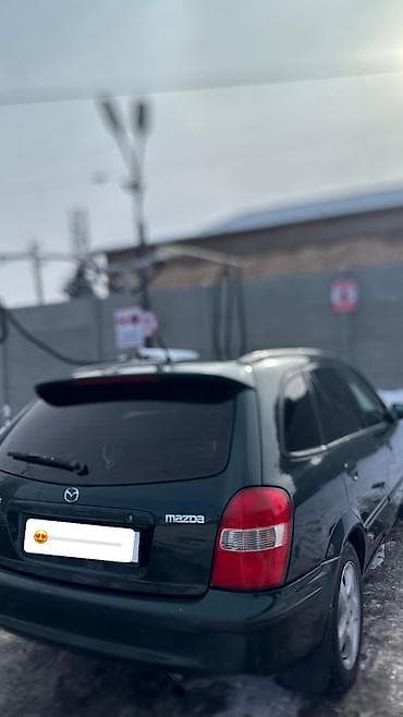 mazda 323 2003: Mazda 323: 2000 г., 1.6 л, Механика, Бензин, Универсал — 9