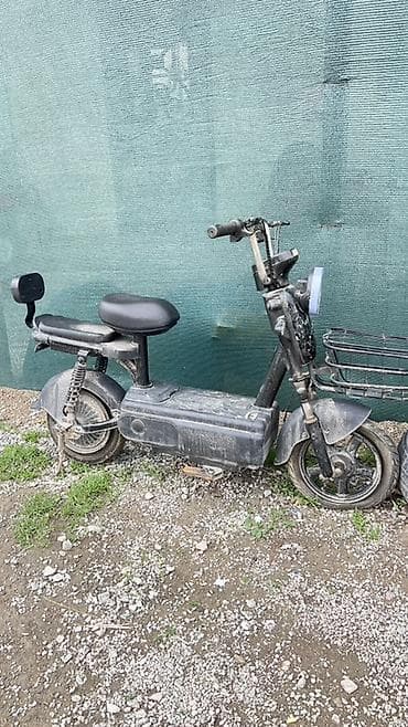 Электрический скутер-компакт - Компоновка «мопед»: рама с центральным