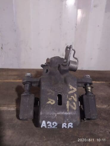 система форсунок: Nissan Cefiro A32 Суппорт тормозной, Ниссан Цефиро А32 супорт, супарт — 1