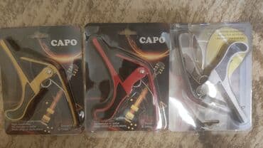 купить гитару в бишкеке бу: Каподастр есть в наличии: металлические и пластиковые . есть доставка — 7