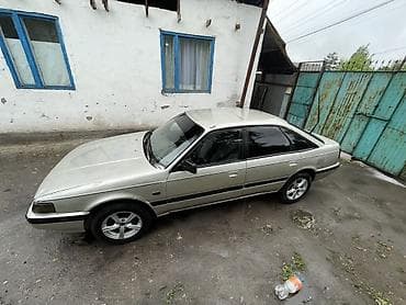 Mazda 626: 1990 г., 2 л, Механика, Бензин, Хэтчбэк — 9
