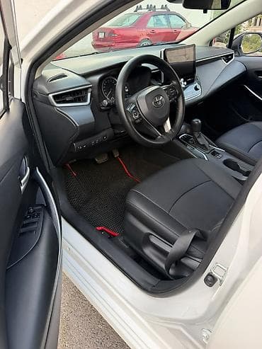 Toyota Corolla: 2021 г., 1.8 л, Автомат, Гибрид, Седан — 4