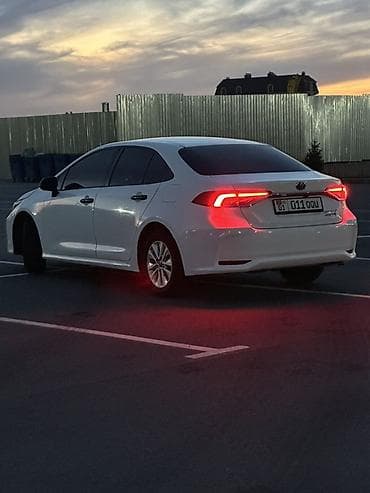 енкар авто: Toyota Corolla: 2019 г., 1.8 л, Вариатор, Гибрид, Седан — 4