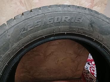 шипованная: Зимняя шипованная шина 225/60 R18. Характеристики: - Тип: зимняя, с — 2