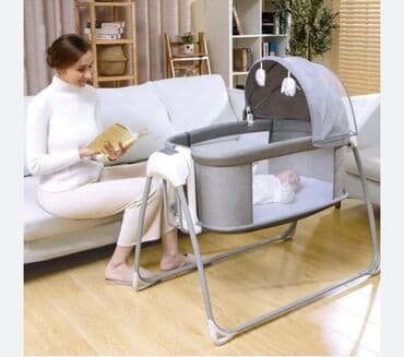 Продается электрическая кроватка-качалка Пользовались пару раз