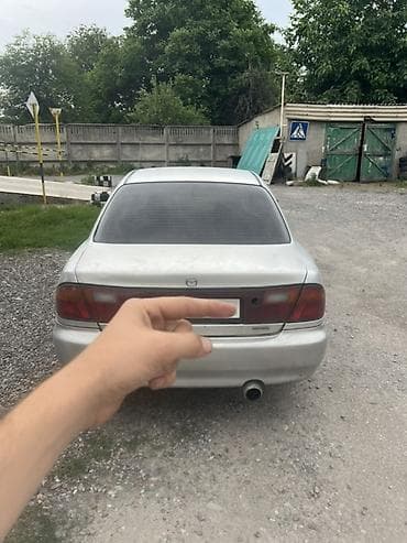 електро машина: Mazda 323: 1995 г., Седан — 3