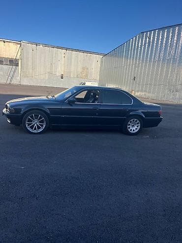 куда: BMW 740: 1996 г. — 2